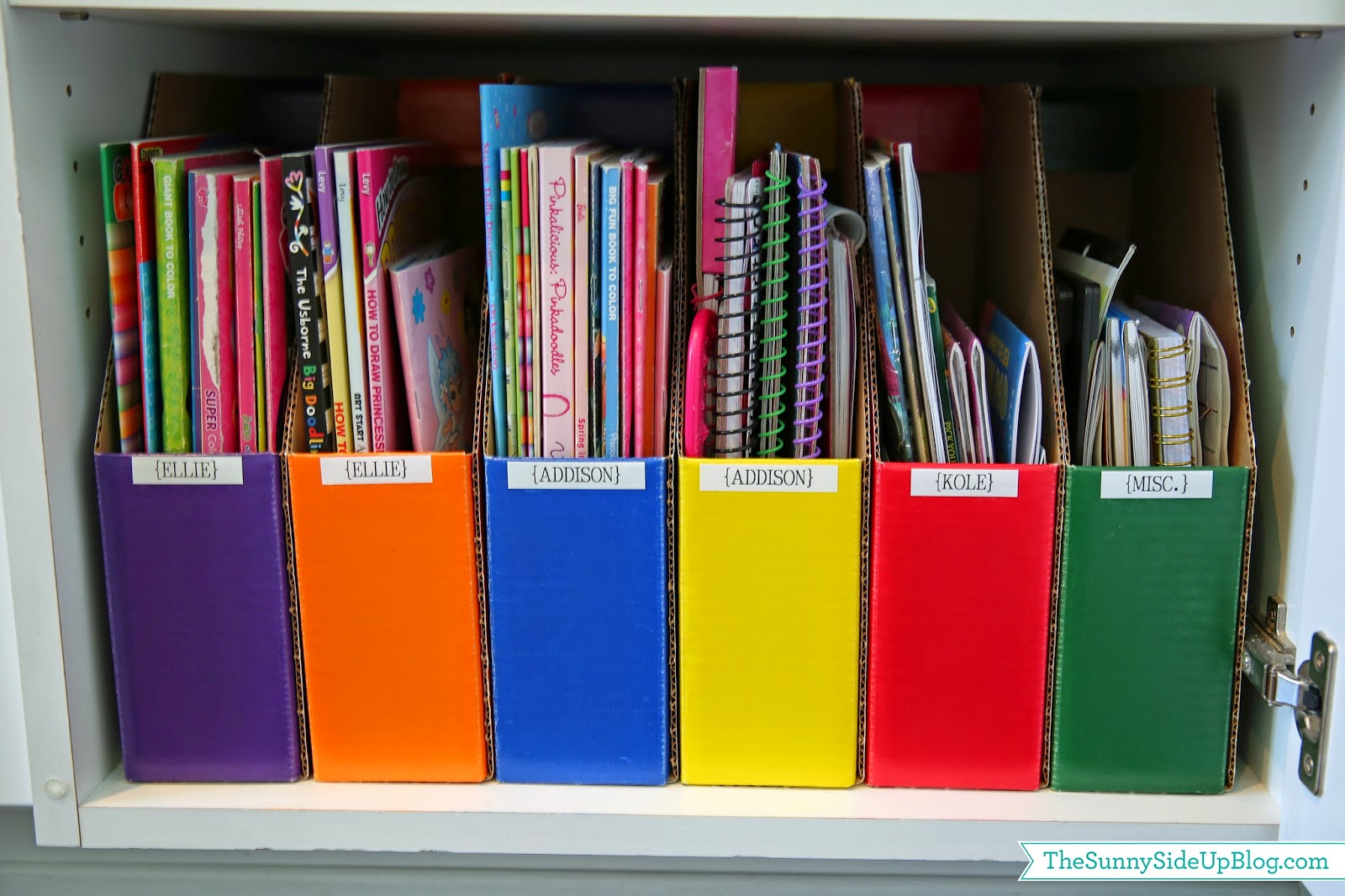 Coloring books and story books can be stored in DIY magazine holders.