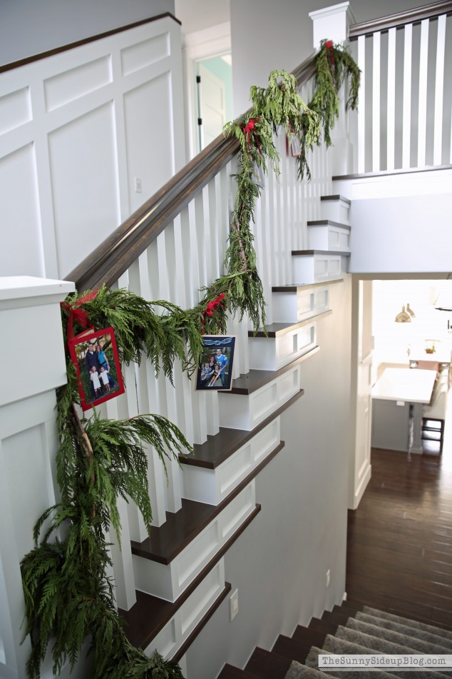 fresh-garland-and-christmas-cards-on-the-staircase