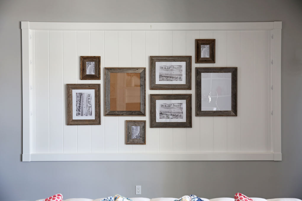 Hang family favorite Christmas pictures to create a Christmas Gallery Wall!