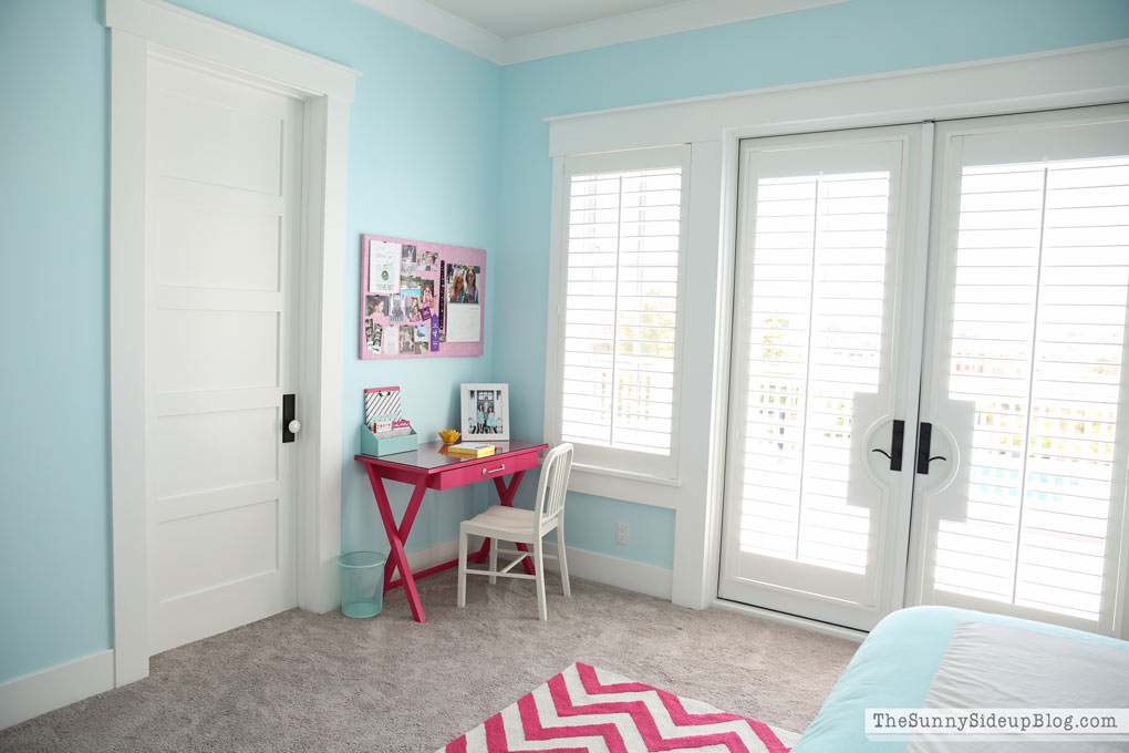 pink and blue shared bedroom